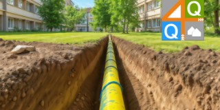 Gas pipeline installation. Yellow gas pipe in a trench, urban infrastructure development.