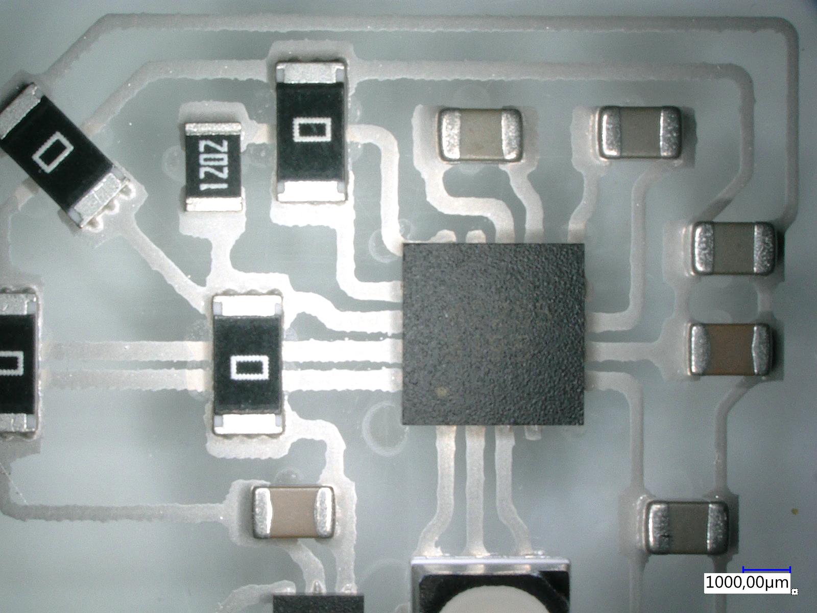 Conductor tracks and contact pads printed on foil with SMD components adhered to them.